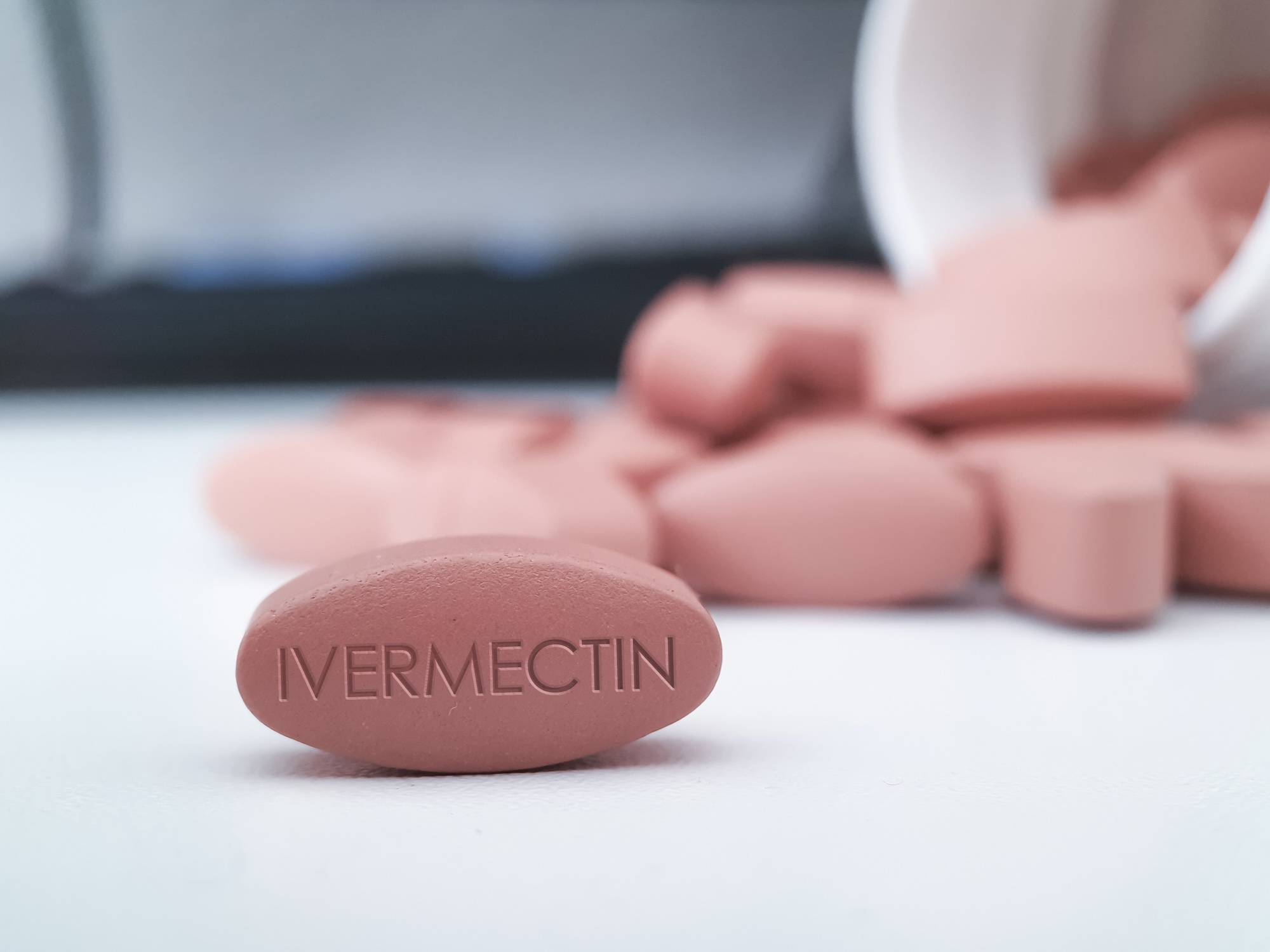 Ivermectin tablets and prescription bottle on a clean medical background — a doctor's guide to ivermectin uses, benefits, and safety