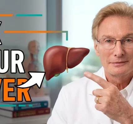 Dr. Colbert pointing to Fix Your Liver Title
