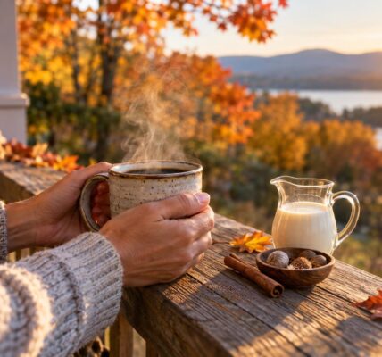 Black coffee with a small pitcher of cream and cinnamon on a sunny porch, a simple swap for non-dairy creamer calories
